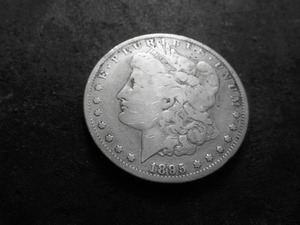 lot 16 image: 1895 O Morgan Silver Dollar