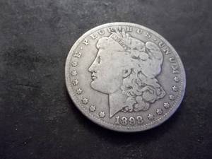 lot 25 image: 1898 O Morgan Silver Dollar