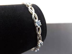 lot 59 image: .925 Sterling Silver Topaz Tennis Bracelet