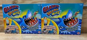 lot 30 image: GIANT SHARK BITE Game lot of 2