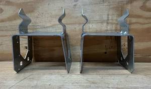 lot 66 image: Simpson Strong-Tie ZMax 5.25 in. H X 5.5 in. W 12 Ga. Galvanized Steel Post Base lot of 2