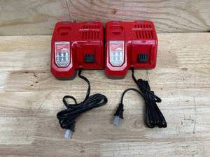 lot 236 image: Milwaukee - Lot of 2 - 48-59-1808 M12 and M18 12 Volt18 Volt Lithium-Ion Multi-Volatge Rapid Battery Charger (Non-Retail Packaging)