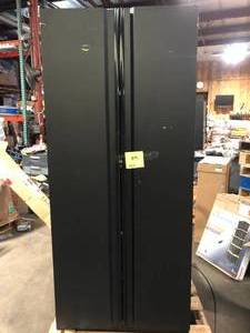 lot 55 image: Husky Heavy Duty Welded 20-Gauge Steel Freestanding Garage Cabinet in Black (36 in. W x 81 in. H x 24 in. D) No Keys   Customer Returns See Pictures