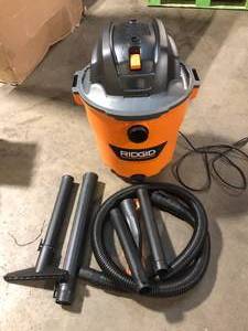 lot 31 image: RIDGID 12 Gal. 5.0 Peak HP NXT Shop Vacuum Wet Dry Vac with General Debris Filter, Locking Hose and Attachments HD1200  Customer Returns See Pictures