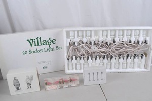 lot 62 image: Village Decor Lot 20 Socket Light Set, Figurines & Flamingo Ornaments
