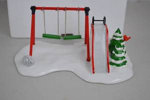 lot 72 image: Dept 56 Snow Village Winter Playground Ceramic Accessory with Box