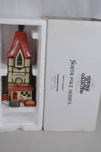 lot 79 image: Dept 56 North Pole Chapel and Rimpys Bakery Christmas Village Lot