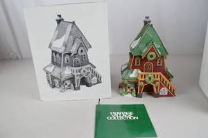 lot 99 image: Department 56 Heritage Village North Pole Santas Rooming House