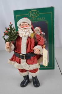 lot 121 image: KSA Collectibles 11-inch Fabrich Santa Figurine with Original Box