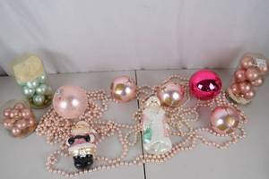 lot 127 image: Collection of Pink and Pastel Christmas Ornaments and Santa Figurines