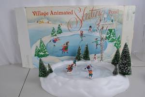 lot 156 image: Department 56 Village Animated Skating Pond Holiday Decor