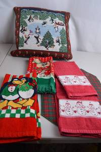 lot 161 image: Holiday-themed towels and decorative pillow