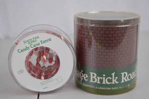 lot 188 image: Dept. 56 North Pole Candy Cane Fence & Village Brick Road Decor