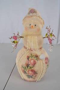 lot 474 image: Handmade Snowman Christmas Decor with Floral Embellishments, 12 in.