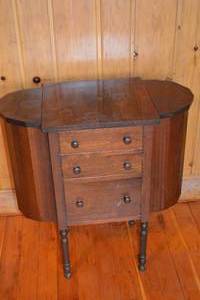 lot 484 image: Vintage Wood Sewing Cabinet with Drawers and Side Bins