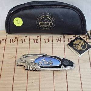 lot 125 image: Motor Harley Davidson Eagle Knife