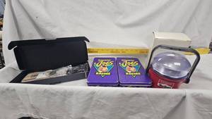 lot 3 image: Smokin Joes Racing Tins, Marlboro Mug, Fender Guitar Model Kit