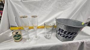 lot 12 image: Bud Light Pail, Pearl Ale Can, SMS Champagne Glasses, Gettyburg Glass