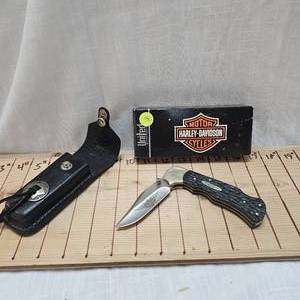 lot 141 image: Motor Harley Davidson Knife Sheath and Uncle Same Folding Knife