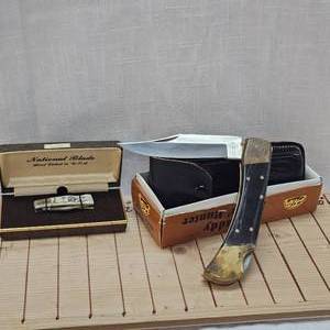 National Blade, Etched Ivory Handle and Black Knife