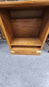 lot 95 image: Book ShelfEntertainment Center-Great Condition, has two shelves and bottom drawer