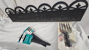 lot 221 image: Fish Spear Head with Landscaping Fence and Stakes