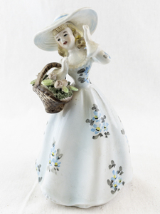 lot 33 image: Lefton 3988 Porcelain Lady Figurine with Basket and Blue Flowers