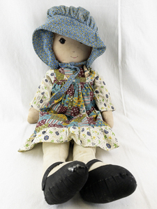 lot 42 image: Vintage Handmade Rag Doll with Patchwork Dress and Blue Bonnet