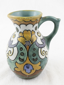 lot 63 image: Gouda Holland Hand-Painted Ceramic Pitcher with Floral Motif