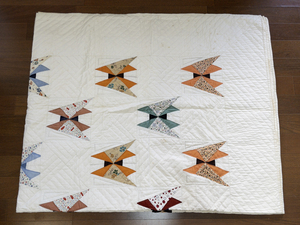 lot 83 image: Handmade Patchwork Quilt with Bow Tie Pattern