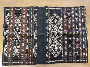 lot 86 image: Handwoven Textile Panel with Geometric Patterns