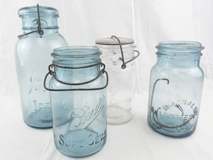 lot 103 image: Set of 4 Vintage Mason Jars Ball and McDonald Embossed Glass