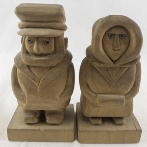 lot 107 image: Pair of 1974 Hand-Carved Wooden Folk Art Figures