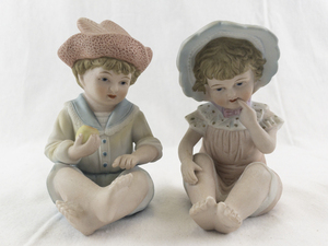 lot 109 image: Andrea by Sadek 1984 Porcelain Bisque Piano Babies Figurines Boy and Girl