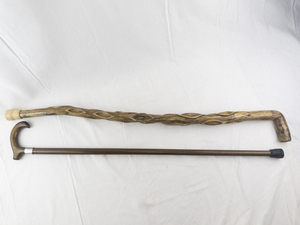 lot 125 image: Pair of Wooden Walking Canes - Carved and Traditional Styles
