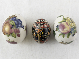 lot 129 image: Collection of 3 Decorative Egg Figurines including The Egg Lady and Ukrainian Pysanka Style