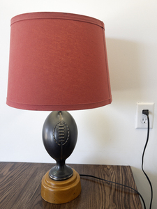 lot 133B image: Football Theme Table Lamp with Red Shade and Wooden Base