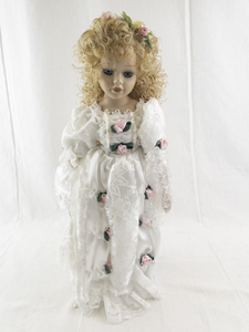 lot 147 image: Porcelain Collectible Doll in White Lace Dress with Floral Accents