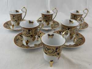 lot 166 image: Set of 5 Fine Porcelain Demitasse Cups and Saucers with Gold and Butterfly Accents