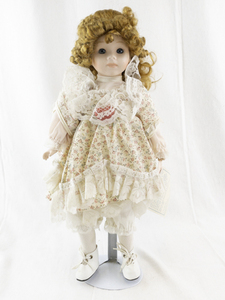 lot 145B image: Sweetheart Collection Porcelain Doll with Curly Hair and Floral Dress
