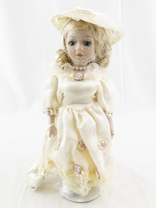 lot 145G image: Porcelain Victorian-Style Doll with Lace Dress and Hat
