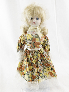 lot 145H image: Vintage Porcelain Doll with Blonde Hair and Floral Dress