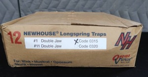 lot 14 image: 12 NEWHOUSE LONGSPRING TRAPS