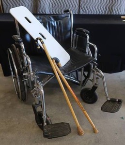 lot 61 image: OVERSIZED WHEELCHAIR AND CANES