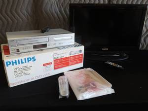 lot 63 image: NIB PHILIPS DVD  VHS & SANYO TV W REMOTE.