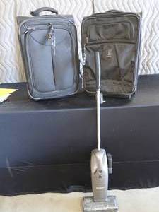 lot 69 image: SUITCASES WITH VACUUM