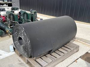 lot 197 image: Large Roll of Conveyor Belt Material Measuring Approx. 48 Inches Wide