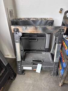 lot 290A image: Four Collapsible Plastic Sawhorses with Integrated Storage