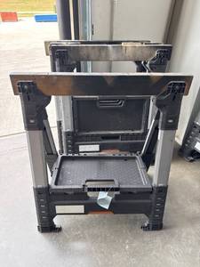 lot 295 image: Four Collapsible Plastic Sawhorses with Integrated Storage