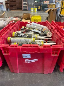 lot 275 image: Milwaukee Box with Caulk and Adhesives